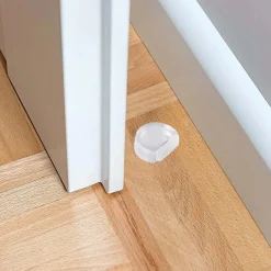 Fermaporta adesivo in plastica trasparente FP 53 TRS