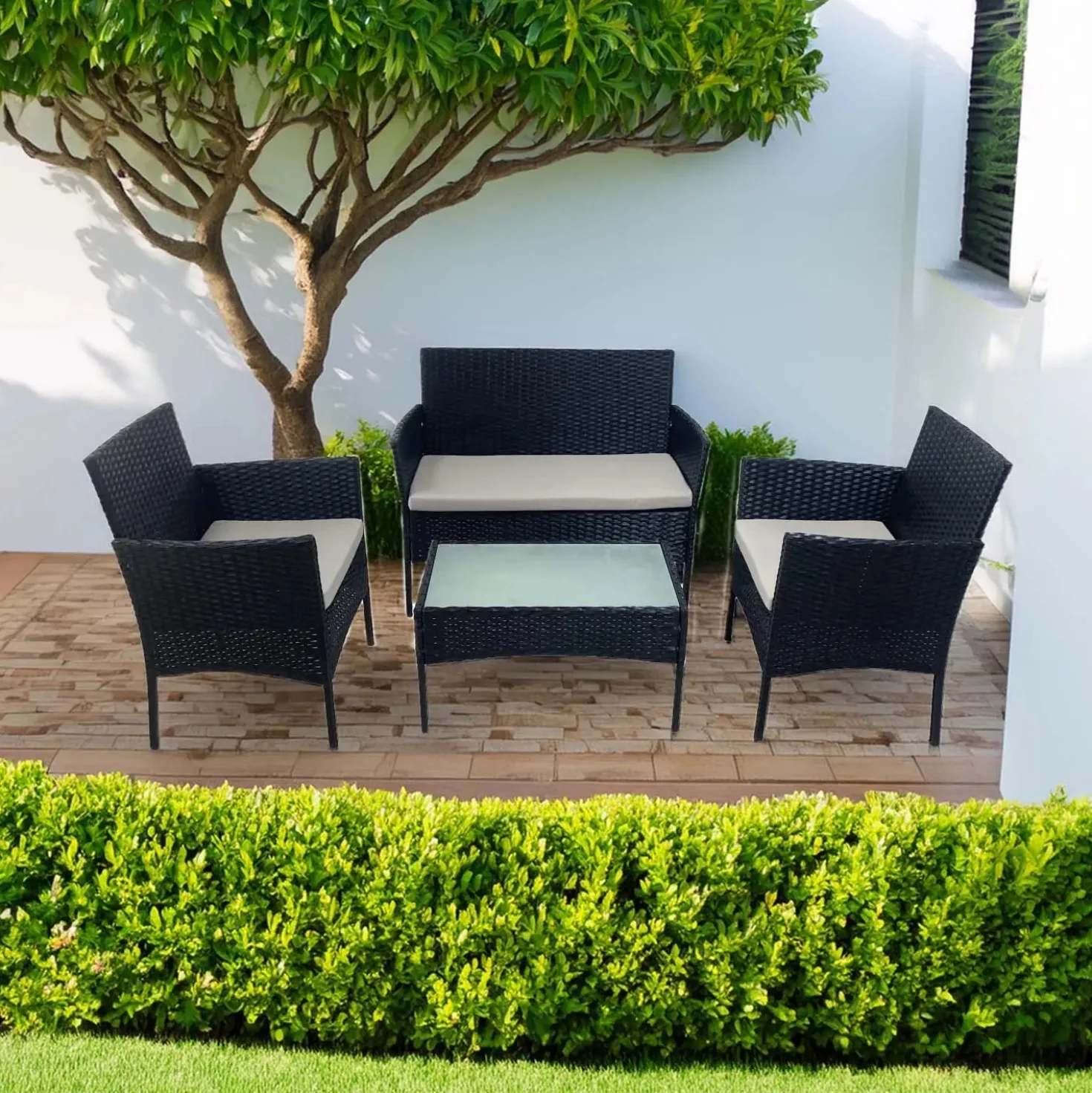 Salotto da giardino in rattan sintetico con cuscini 4 posti