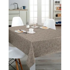 Tovaglia in pvc cerato goffrato con fondo beige e foglie bianche al metro